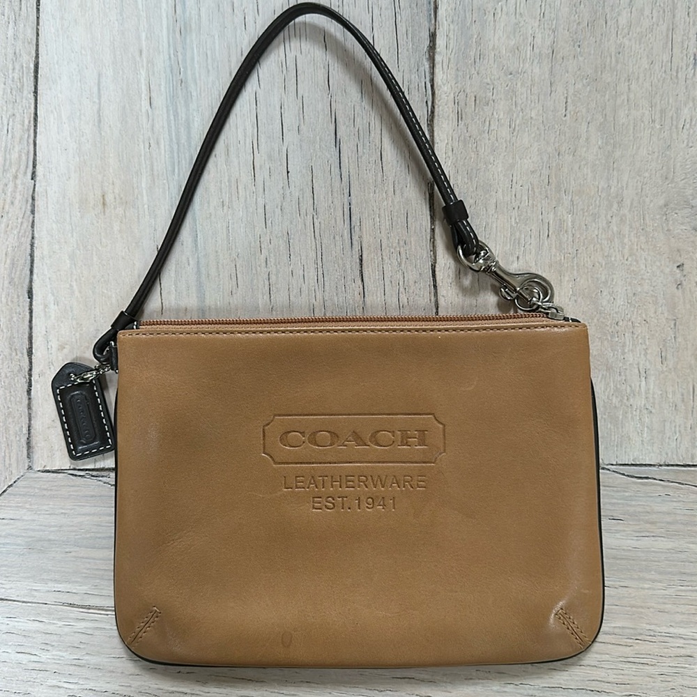 COACH LEATHERWARE EST 1941 Wristlet.7.5”x5” 6”drop on handle. A Rare find!